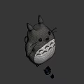 Gray Totoro Character With Pointed Ears White Belly And Small Blue Figure