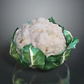 Natural Organic Fresh Cauliflower With Green Leaves On Dark Surface