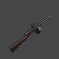 Classic Vintage Weapon Featuring Black Barrel Wooden Stock and Circular Drum Magazine