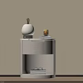 Modern Light Gray Bedside Table With Drawer Open Shelf And Pink Lamp Glass Cup Books