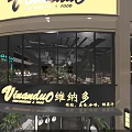 Modern Restaurant Interior Design With Decorative Ceiling Lights Bar Counter Menu Screens And Green Plants