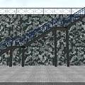 Outdoor Metal Staircase Featuring Blue Railings And Camouflage Patterned Wall Design