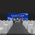 SPD Bank Themed Stage with Illuminated Blue Lighting Branded Display Stands and Digital Screens