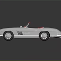 Vintage Silver Mercedes Convertible With Red Interior And Chrome Accents