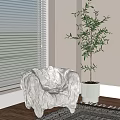 Plush Textured Single Seater Sofa With White Potted Plant White Blinds And Wooden Floor Rug