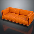 Orange Modern Two-Seater Sofa with Smooth Leather Surface and Black Legs in Interior