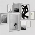 Stylish Photo Frames Displaying Black White Artworks And Palm Tree For Wall Decor