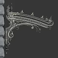 Ornate Iron Awning With Intricate Designs Mounted On Stone Wall Above Windows