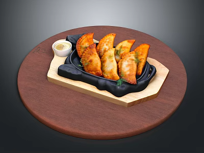 Crispy Fried Dumplings Served On Black Iron Plate With Dipping Sauce And Dill 3d model