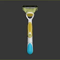 Modern Colorful Razor With Green Head Yellow Accents And Blue Handle Grip