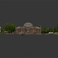 Red Brick Building Exterior With Green Trees Front Parking Area Adjacent Structures And Windows