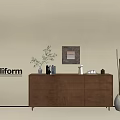 Stylish Brown Console Cabinet with Drawers Vase Plant and Picture Frame Decor