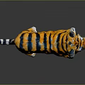 Plush Tiger Toy With Orange Black Stripes And White Paws Standing On Dark Background