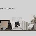 Decorative Shelf Display With Frames Books Vase Mug And Plant Branches