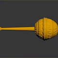 Golden Carved Ceremonial Weapon With Long Handle And Shiny Surface