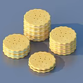 Stacked Yellow Sandwich Cookies with Holes on Surface and Various Heights