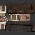 Dark Brown Tufted Sofa With Stacked Suitcases Wooden Boxes And Small Statue