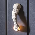 Modern Artistic Muscular Arm Sculpture Wall Lamp Holding Glowing Light Mounted on Textured Wall