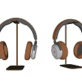 Sleek Modern Headphones with Brown Leather Cups and Silver Metal Stands
