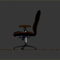 Black And Brown Office Chair With Armrests On Wheeled Base Wooden Floor