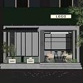 Green Awning Coffee Shop Storefront With Glass Doors Outdoor Seating And Plants