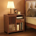 Wooden Bedroom Nightstand With Table Lamp Photo Frame And Books Next To Bed