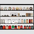 Tea Set Collection Display on Multi Layered Shelf with Tea Cakes and Colorful Canisters