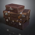 Vintage Leather Suitcases Stacked With Metal Hardware And Brown Exterior