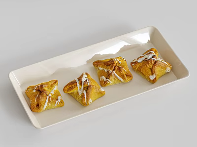 Delicious Four Puff Pastry Snacks With White Icing On White Rectangular Plate 3d model