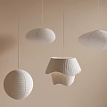 White Hanging Pendant Lights with Various Shapes and Paper Texture Against Light Beige Wall