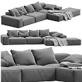 Gray Upholstered L shaped Sectional Sofa With Plush Pillows And Soft Throw Blanket