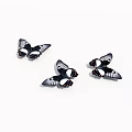 Three Black Butterflies With White And Orange Spots On White Background