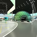 Modern Exhibition Hall Interior With Green Dome Structure And Tech Display Elements
