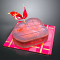 Heart Shaped Chocolate Cake on Red Gold Checkered Mat With Decorative Flag