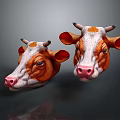 Two Brown And White Cow Head Models With Pink Noses And Big Ears