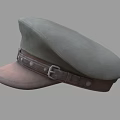 Green Fabric Hat With Brown Brim Leather Strap Metal Buckle And Round Badge