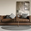 Modern Brown Two-Seater Sofa with Gray Cushions Round Gray Rug and Abstract Geometric Wall Art