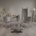 Silver Modern Table Chair Set With Metal Slat Chairs Round Spherical Base Green Plant
