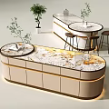 Modern Kitchen Interior With Curved Marble Countertop Cabinets Island Stools And Plants