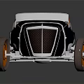 Classic Vintage Open Top Roadster Featuring Brown Seats Orange Wheels And Black Blue Body