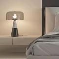 Modern Minimalist Table Lamp With Transparent Lampshade On Bedroom Bedside Table