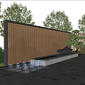 Wooden Feature Wall With Wavy Vertical Slats Warm Lighting Water Fountain and Pine Tree