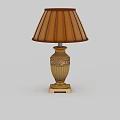 Classic Table Lamp With Brown Fabric Shade Beige Carved Base And Ornate Details