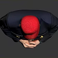 Man In Red Hat Dark Blue Jacket And Red Patterned Shorts Posing With Crossed Hands