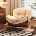 Beige Single Rocking Sofa With Soft Cushion Throw Blanket Near Wooden Cabinet Window And Plant