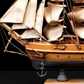 Decorative Ornament Set Featuring Wooden Sailing Ship Model with Detailed Sails on Stand Base