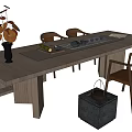 Wooden Tea Table and Chairs with Tea Set Vase and Stone Bucket Decor