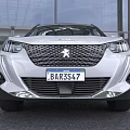 White Peugeot SUV With Modern Headlights And Grille On Street