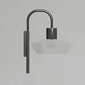 Modern Wall Sconce With Curved Metal Arm And Transparent Glass Shade On White Wall