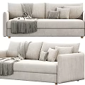 Light Gray Double Sofa With Throw Pillows And Cozy Blanket In Modern Design